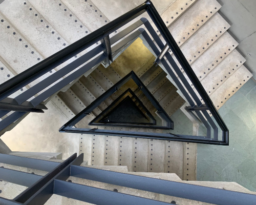 traiangle shaped stairs during economic challenges