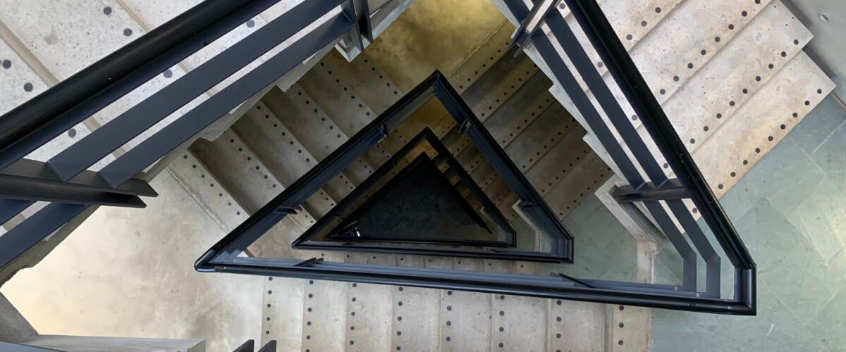 traiangle shaped stairs during economic challenges
